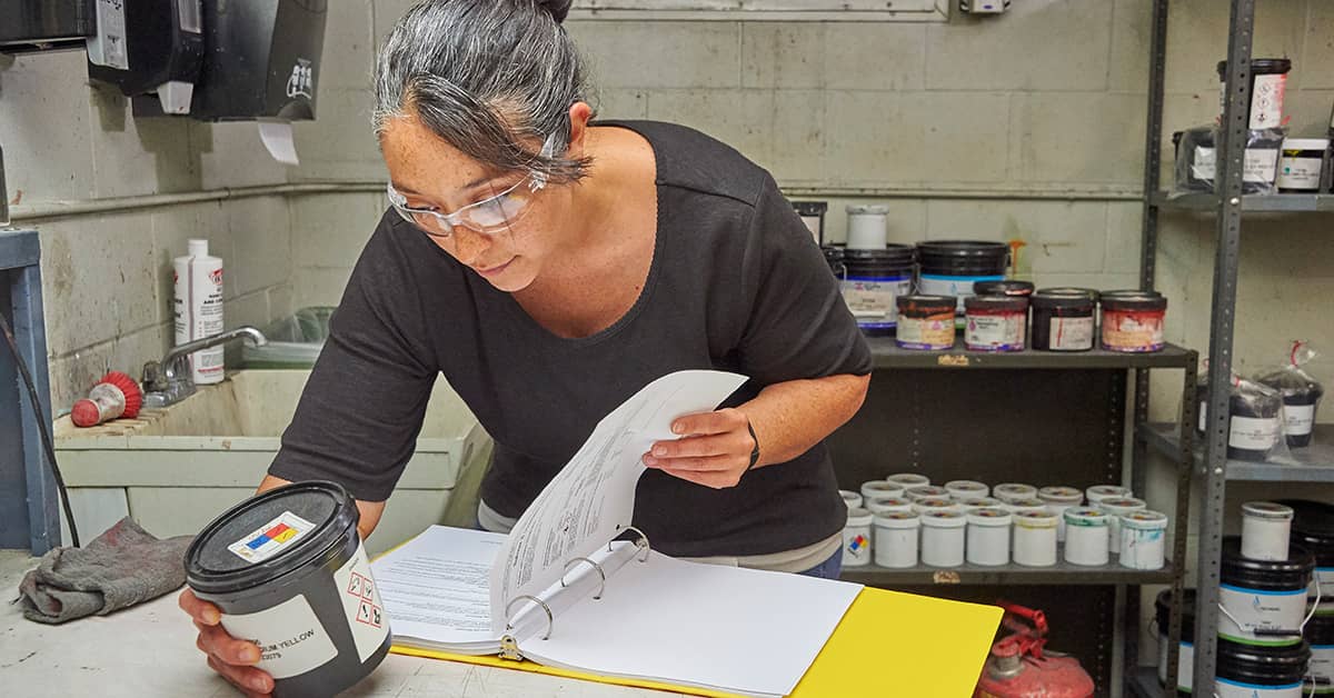 Woman looking up an SDS for a chemical