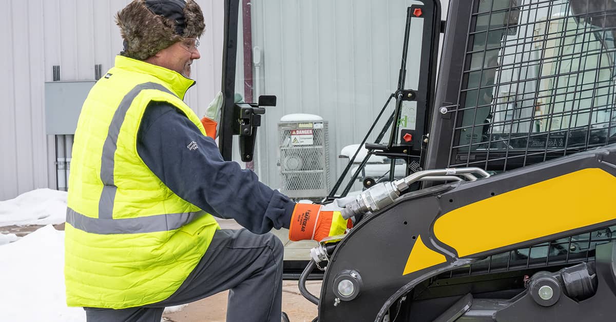 Man working outside in winter gear