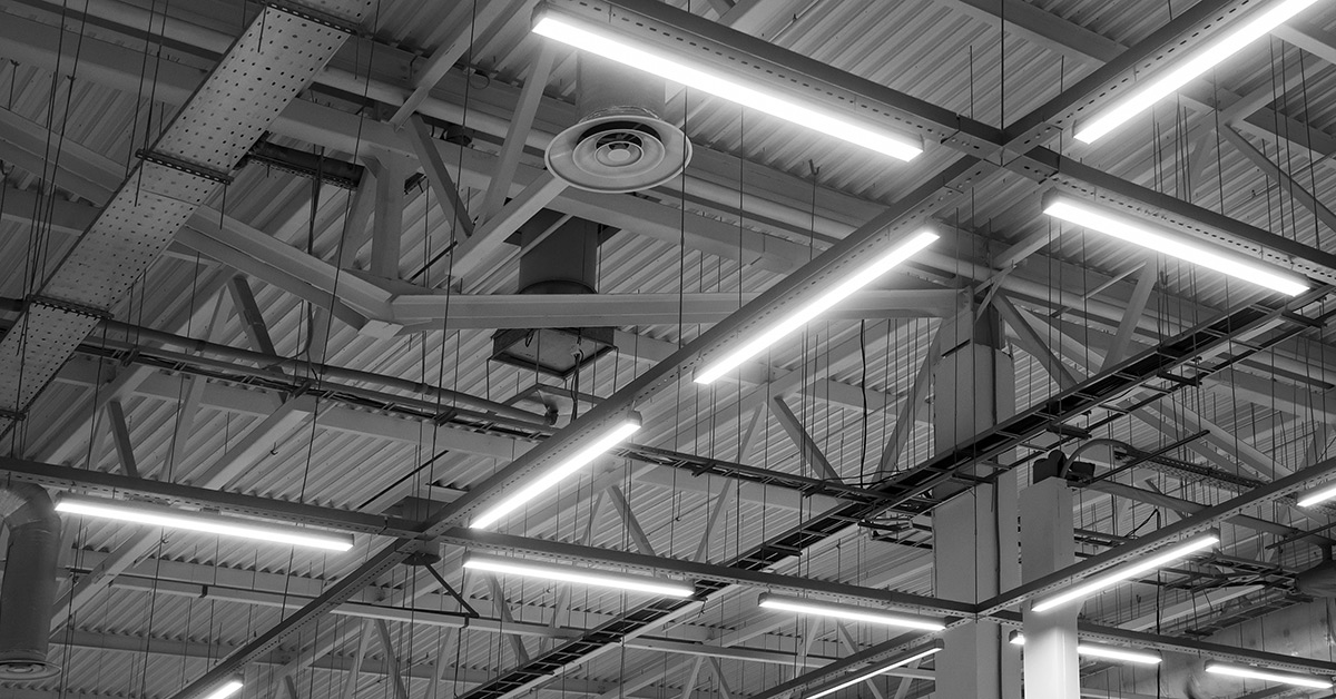 Ventilation system with lighting in industrial and commercial premises under the ceiling, monochrome.