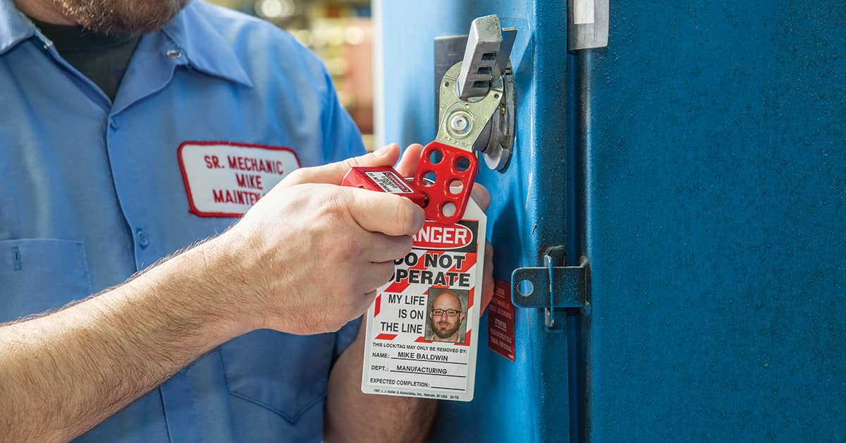 Lockout Tagout - maintenance working locking out power supply
